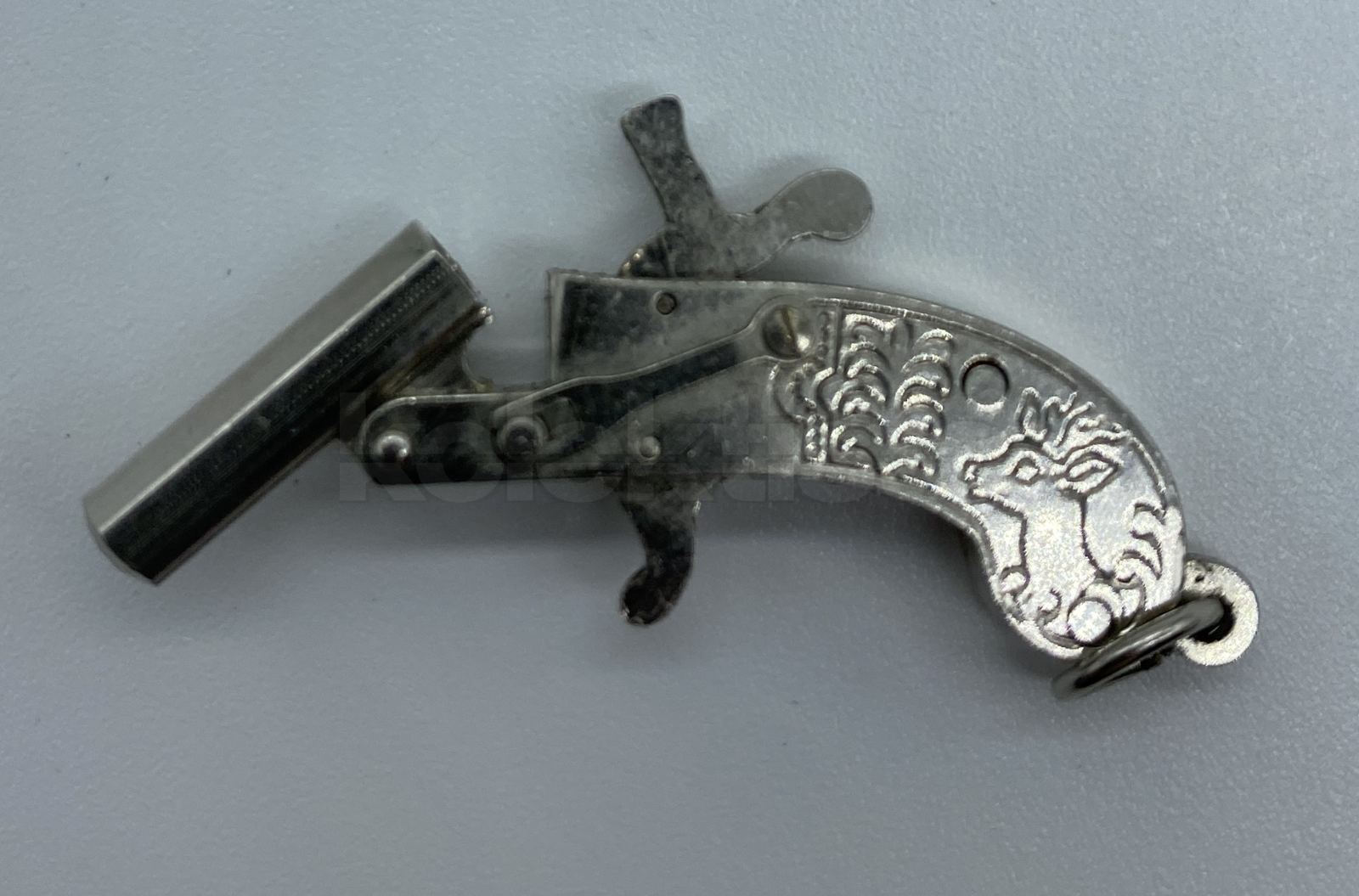 Miniaturní pistolka zn. AUSTRIA č.1
