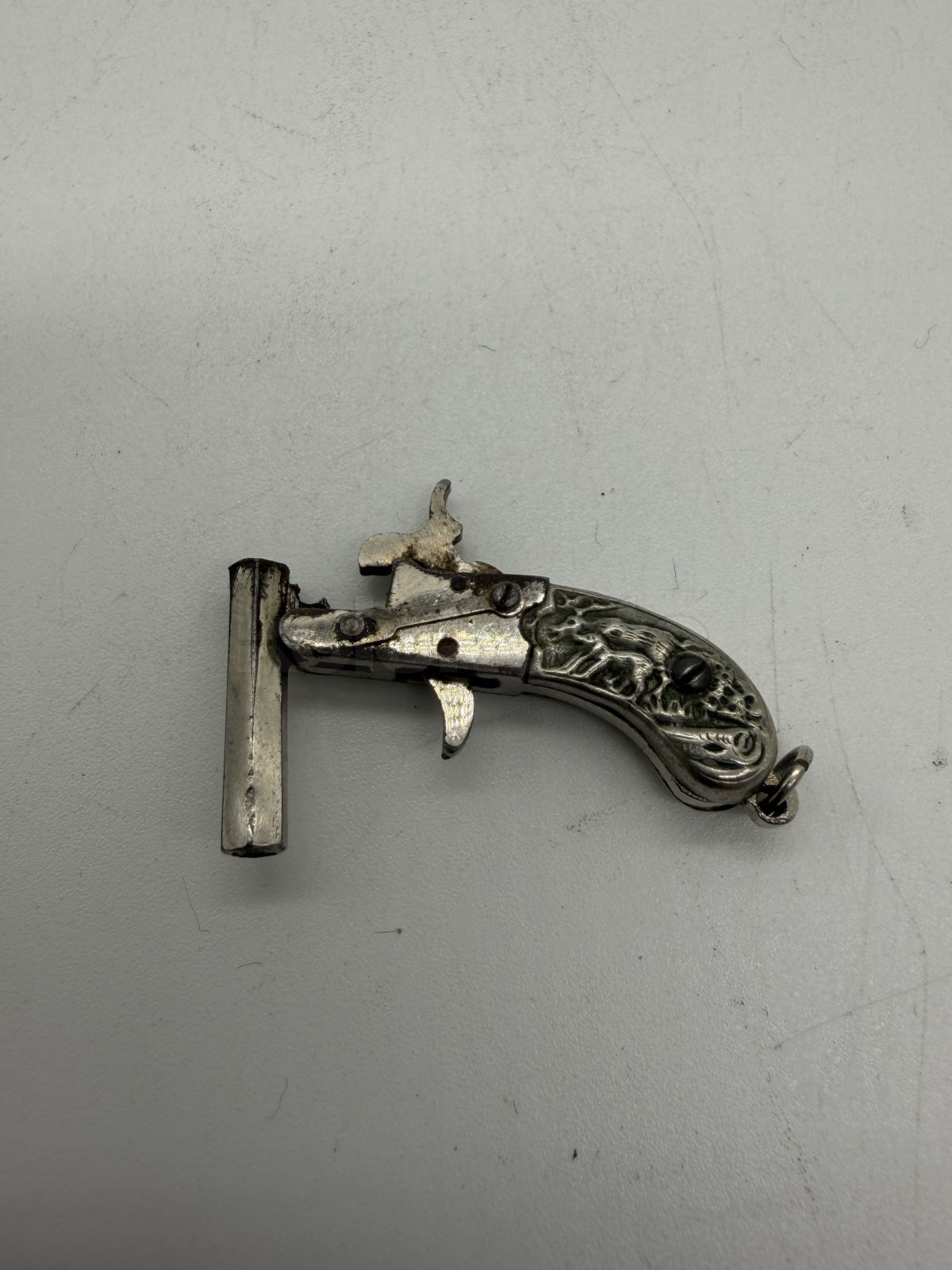 Miniaturní pistolka zn. AUSTRIA č.4