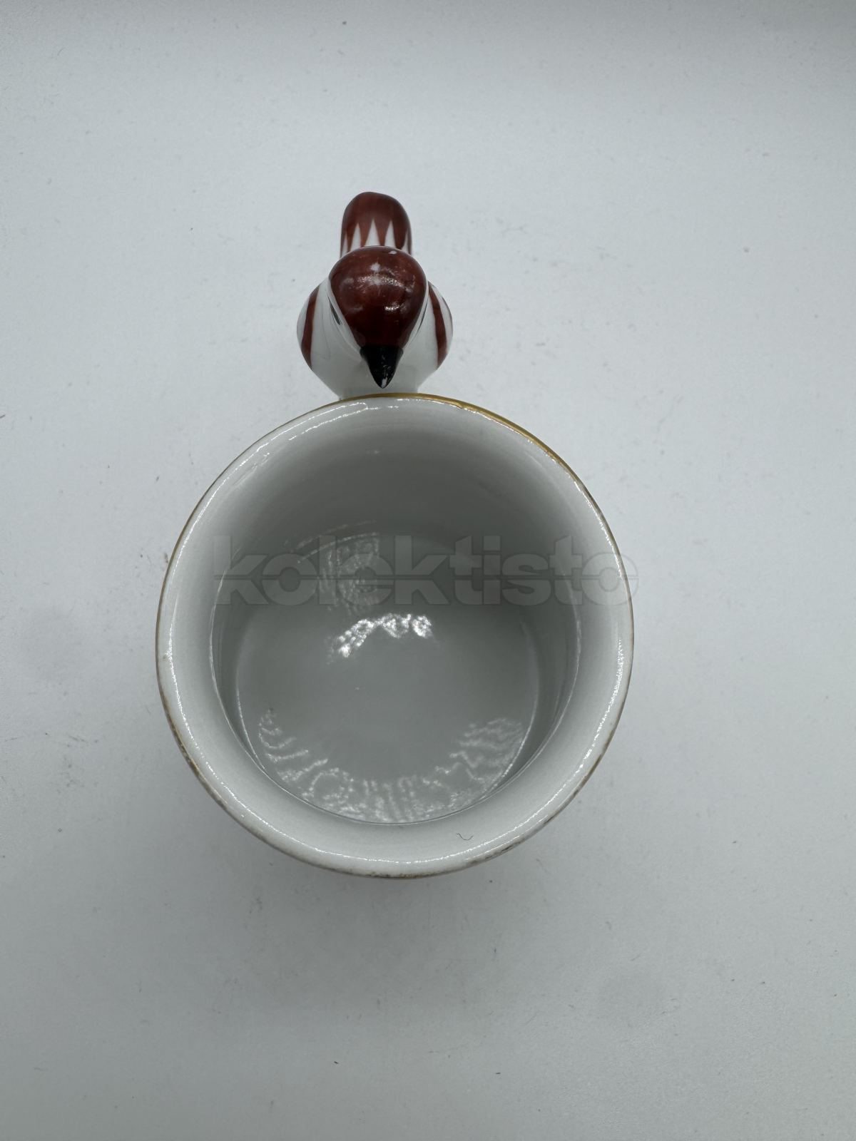 Porcelánový hrnek s ptáčkem