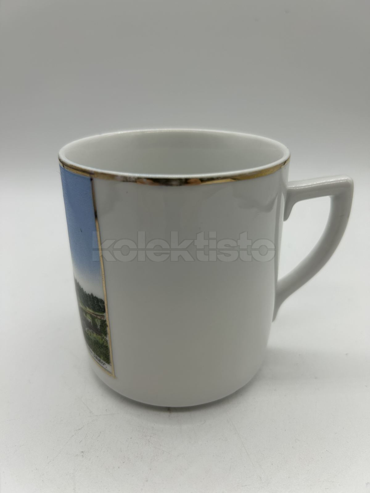 Porcelánový hrnek s obrázekm města DOLLFUSS-KIRCHE HOHE....