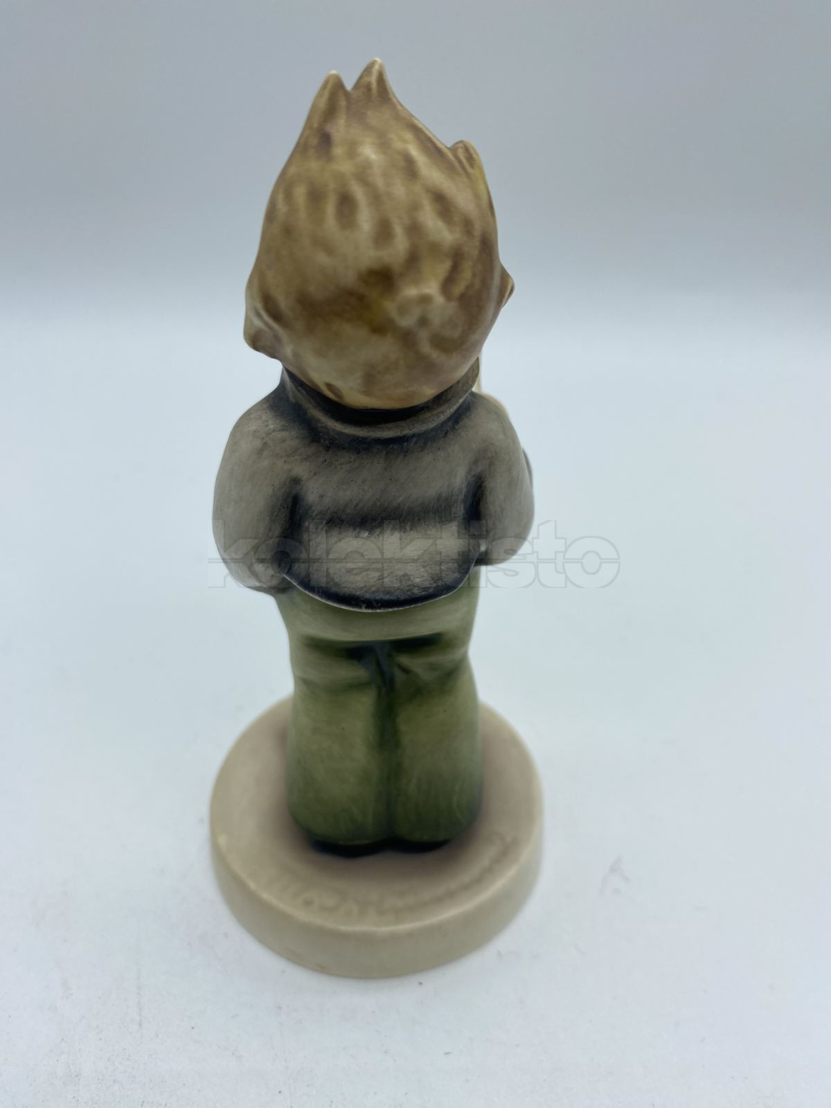 Porcelánová figurka ZPĚVÁČEK