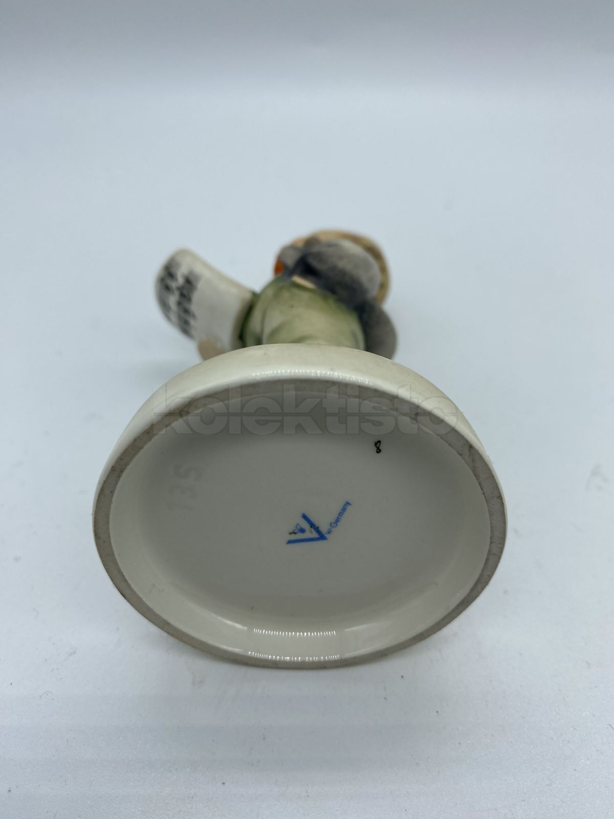 Porcelánová figurka ZPĚVÁČEK