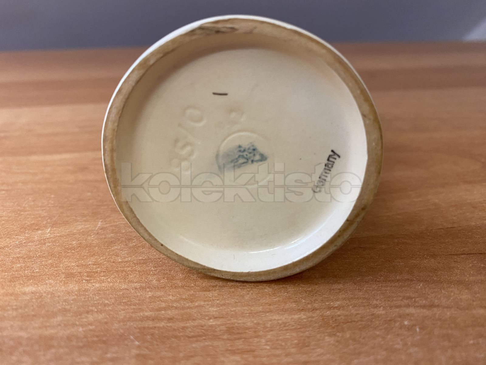 Porcelánová figurka CHLAPEC S TRUBKOU