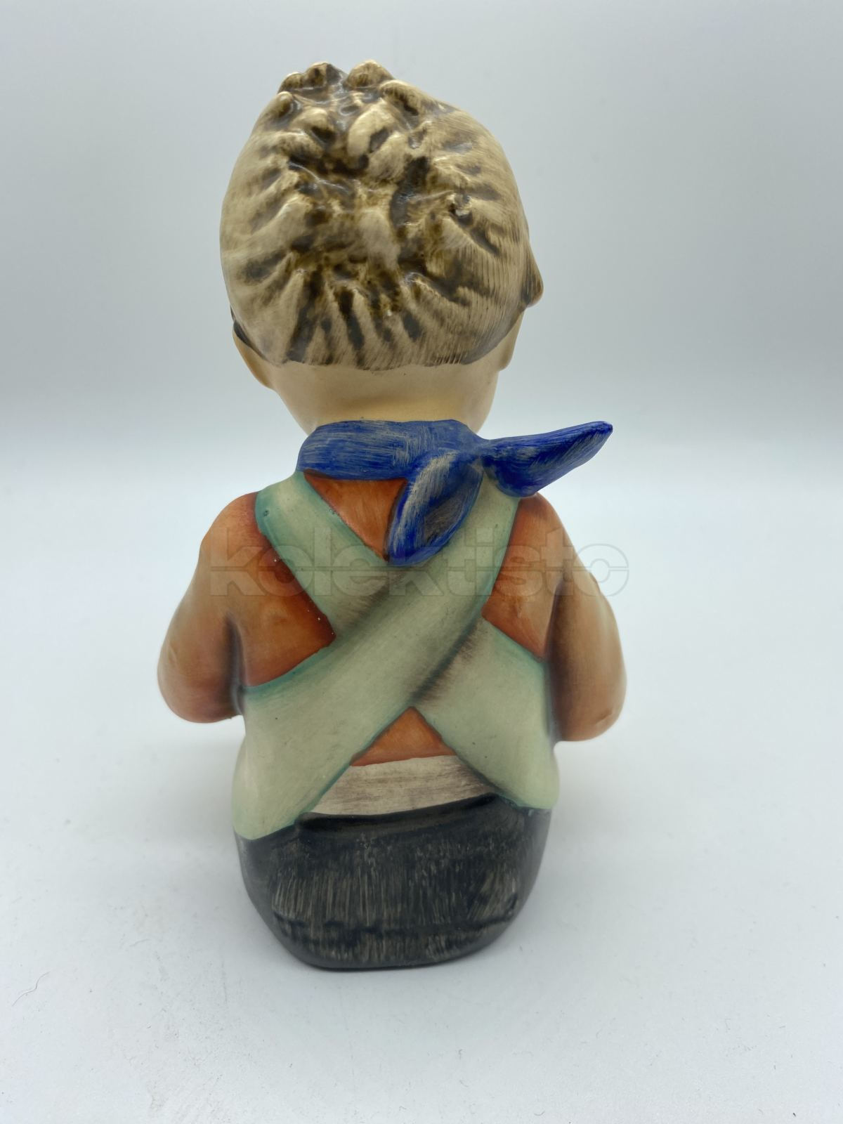 Porcelánová figurka ČTENÁŘ