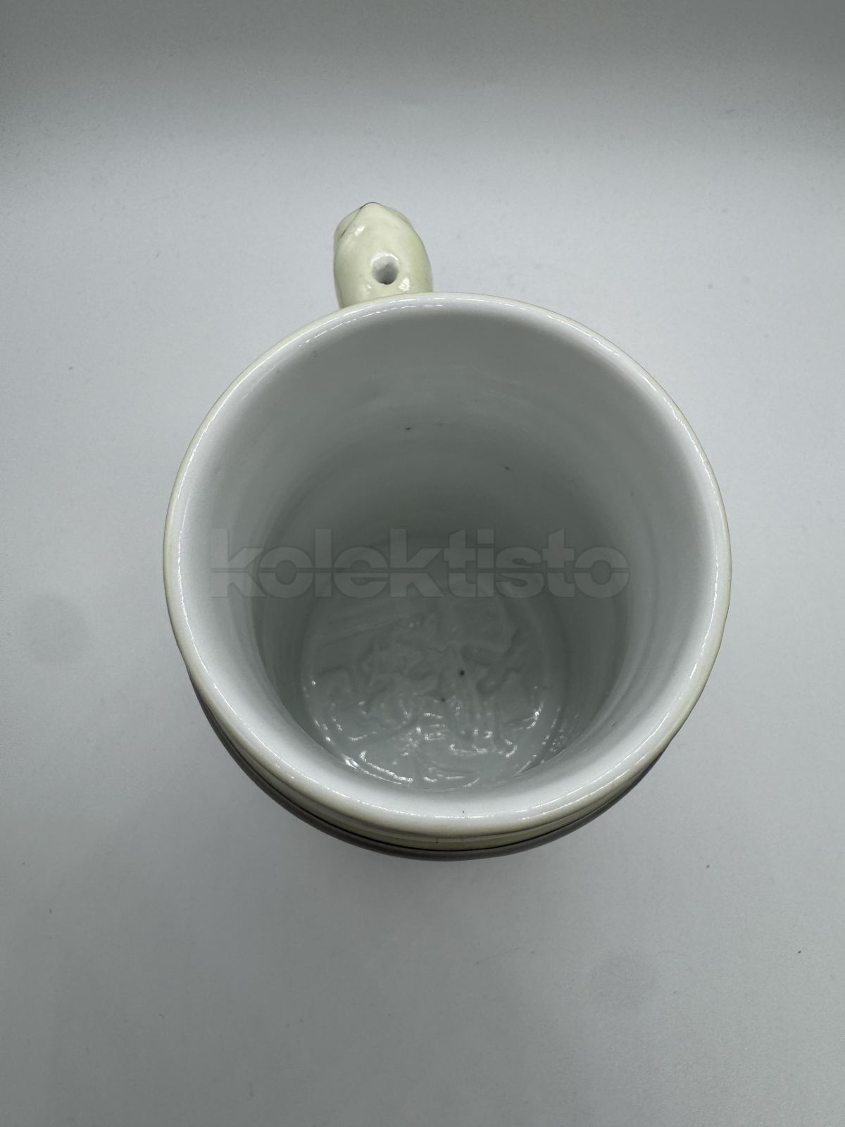 Porcelánový korbel s průsvitkou