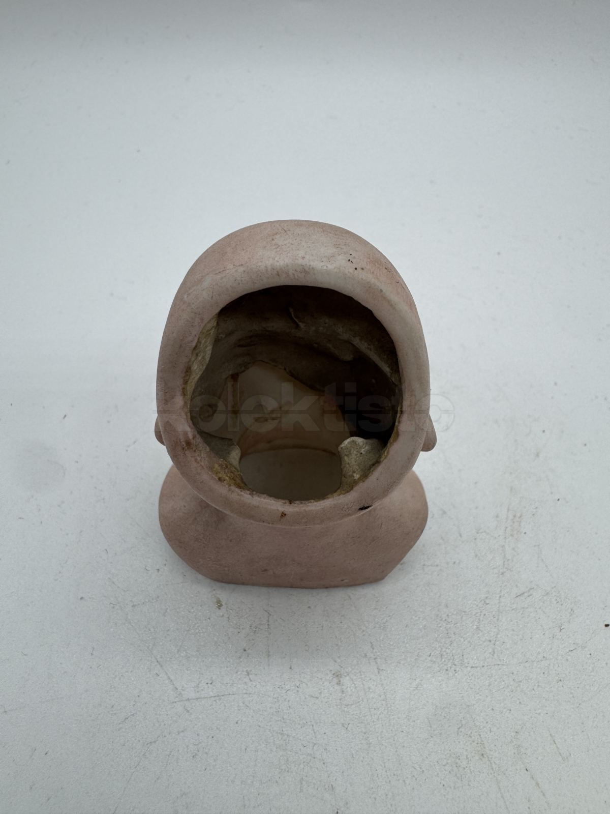 Porcelánová hlavička panenky