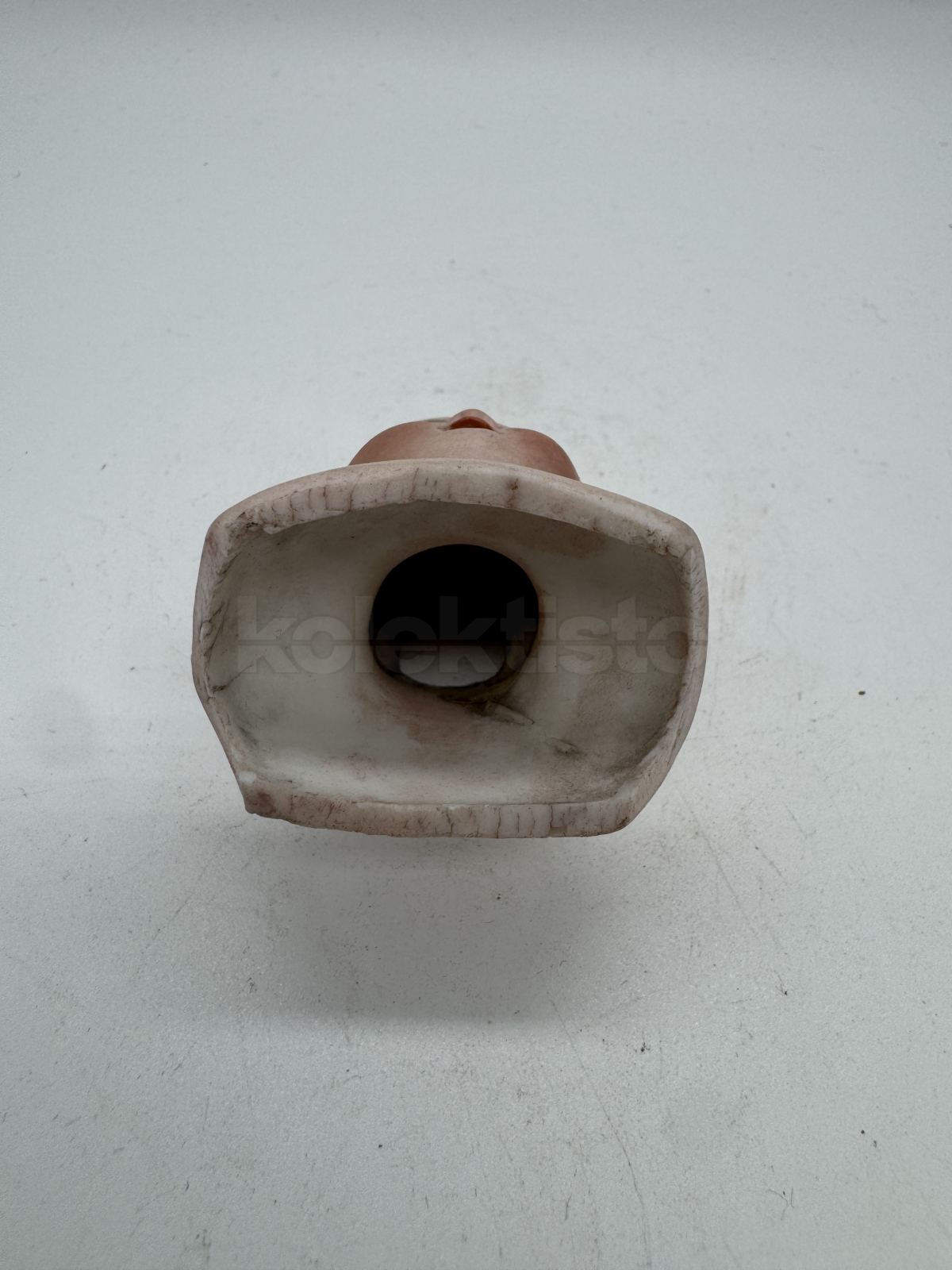 Porcelánová hlavička panenky