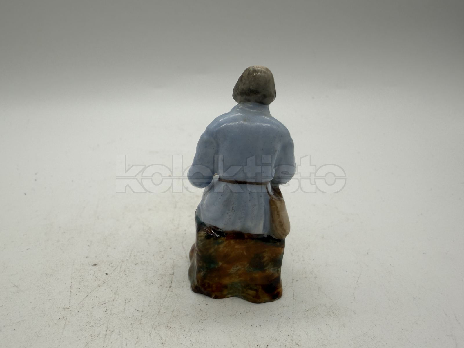 Porcelánová soška muže