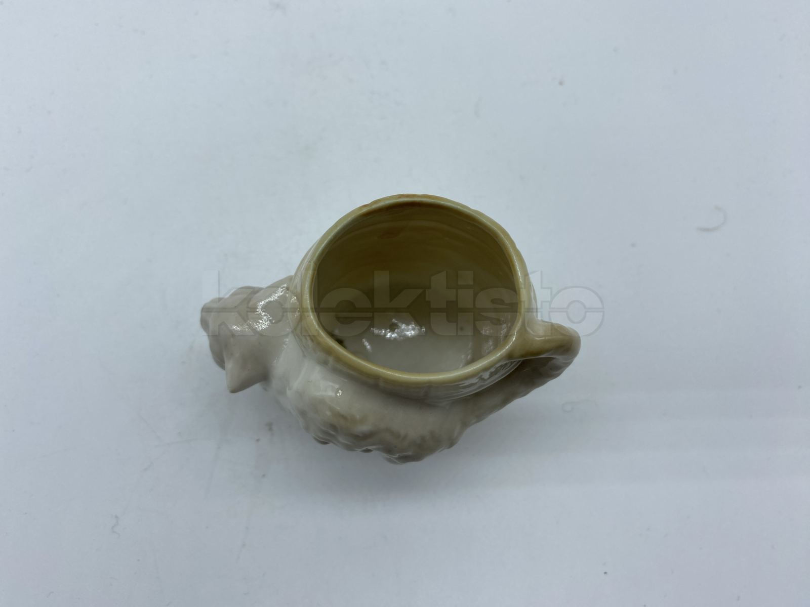 Porcelánový jehelníček KOČKA, nápis VICTOR SCHMIDL+FILS