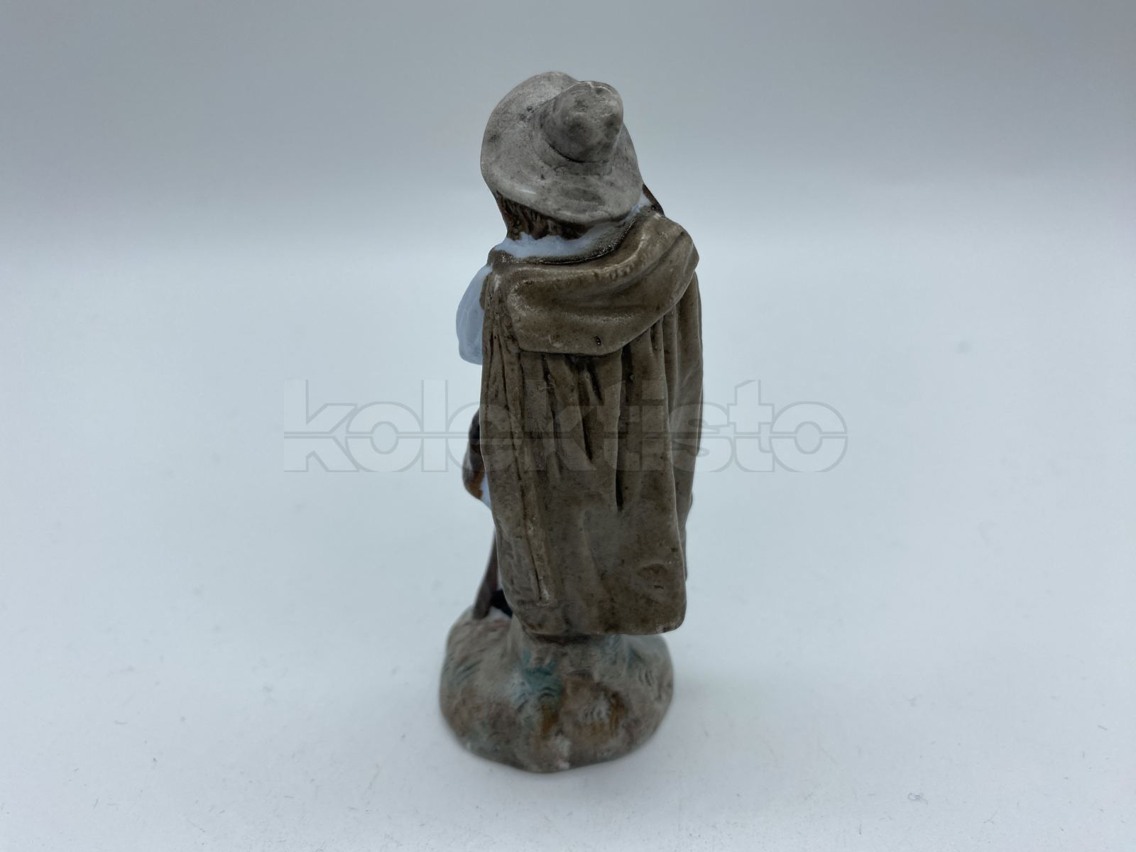 Porcelánová figurka muže