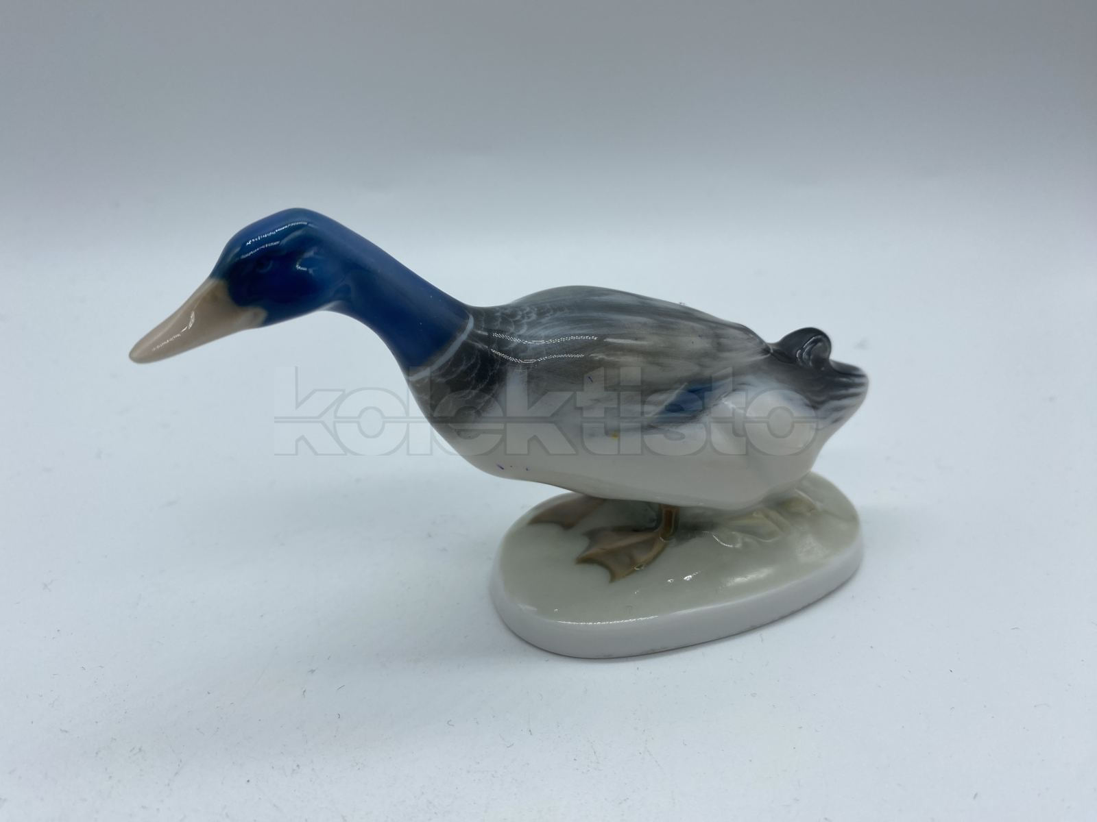 Porcelánová soška kachna