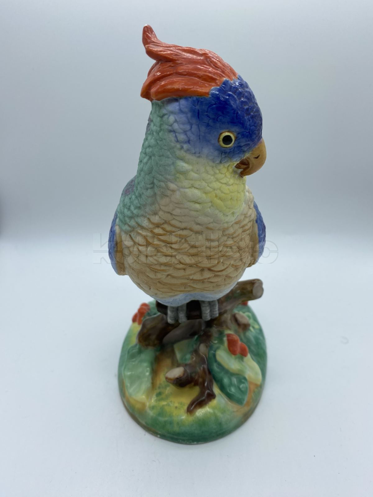 Porcelánová soška papoušek