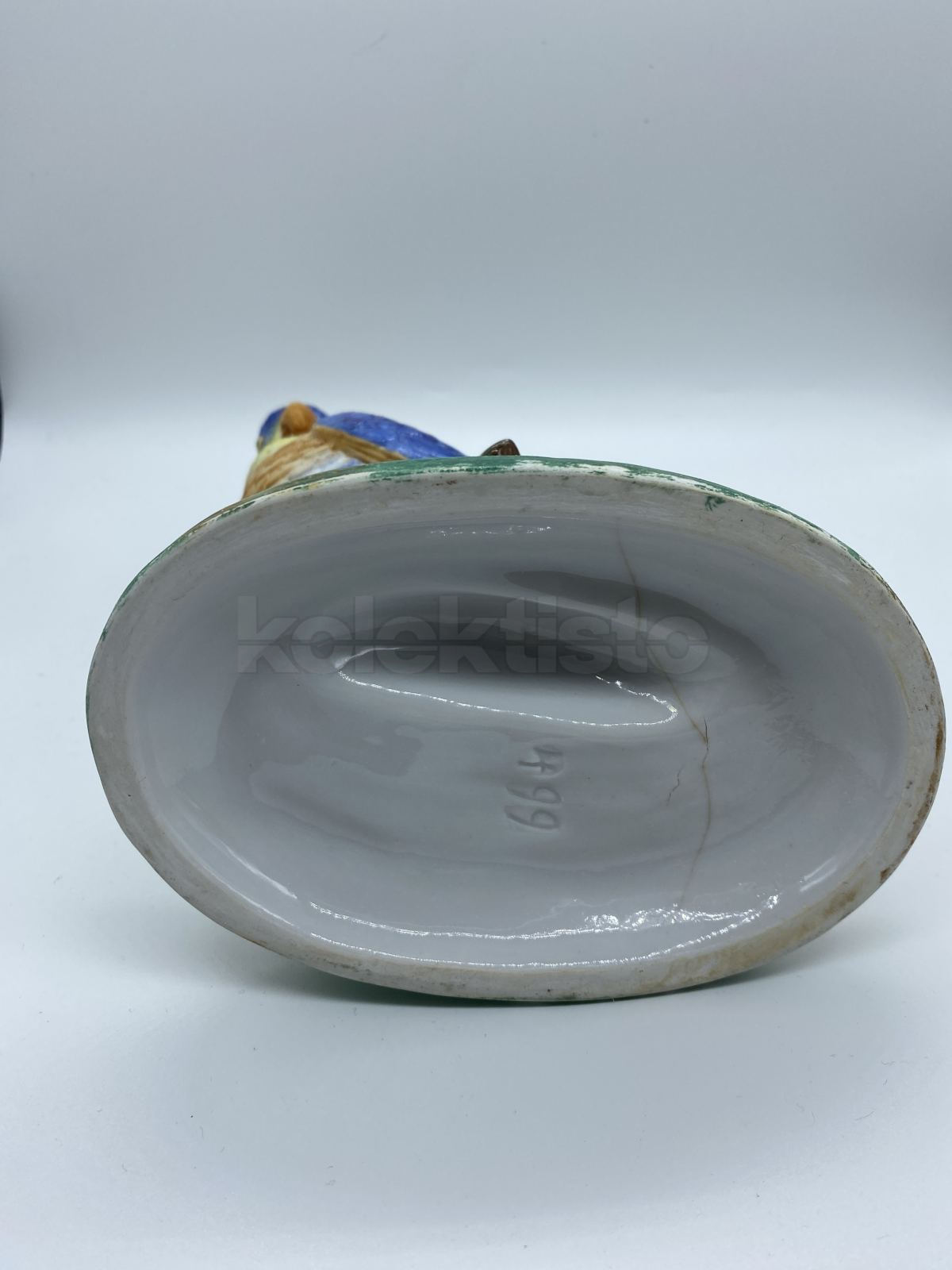 Porcelánová soška papoušek