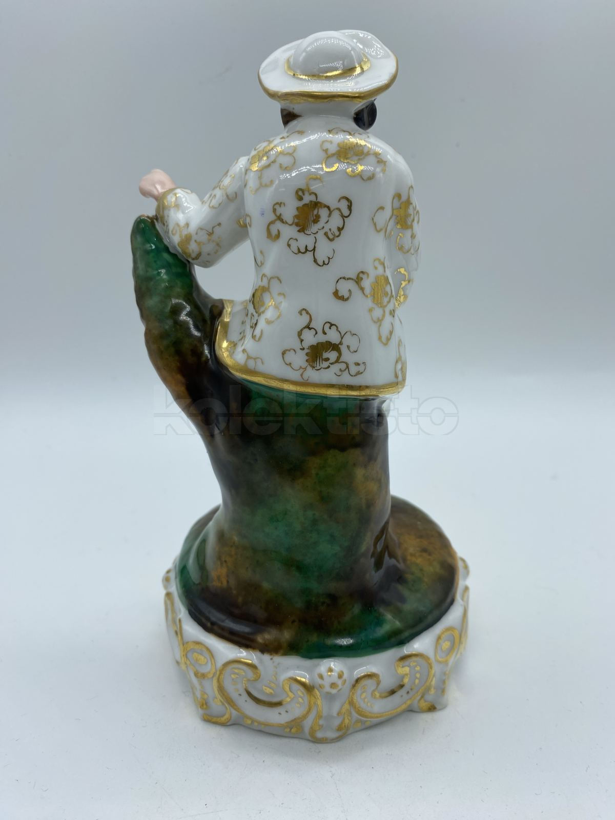 Porcelánová soška muže