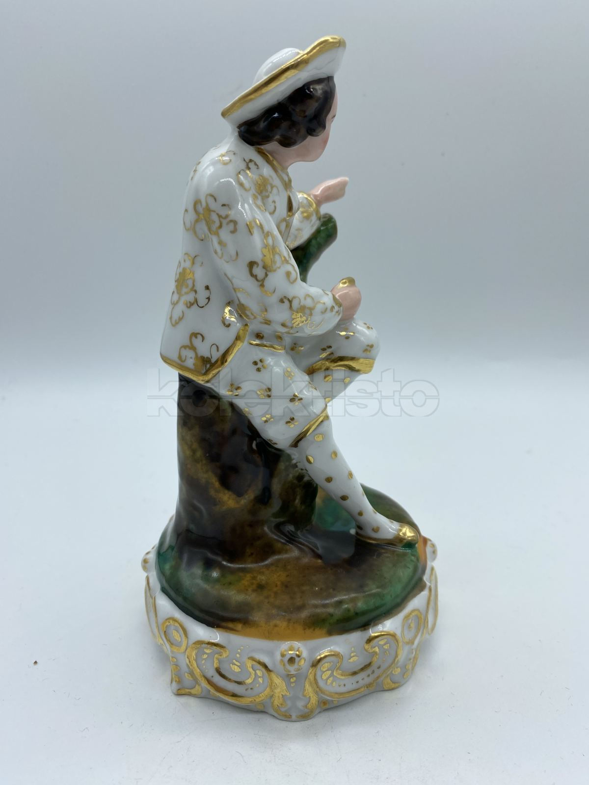 Porcelánová soška muže