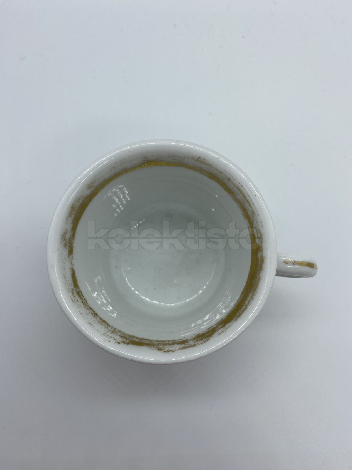 Porcelánový šálek