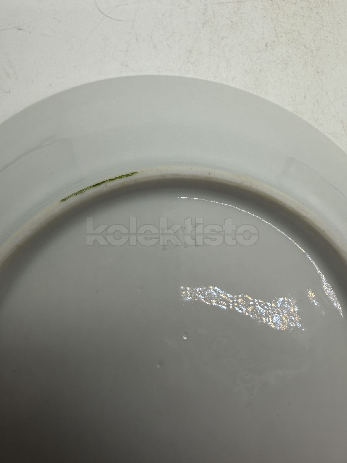 Porcelánový šálek s podšálkem