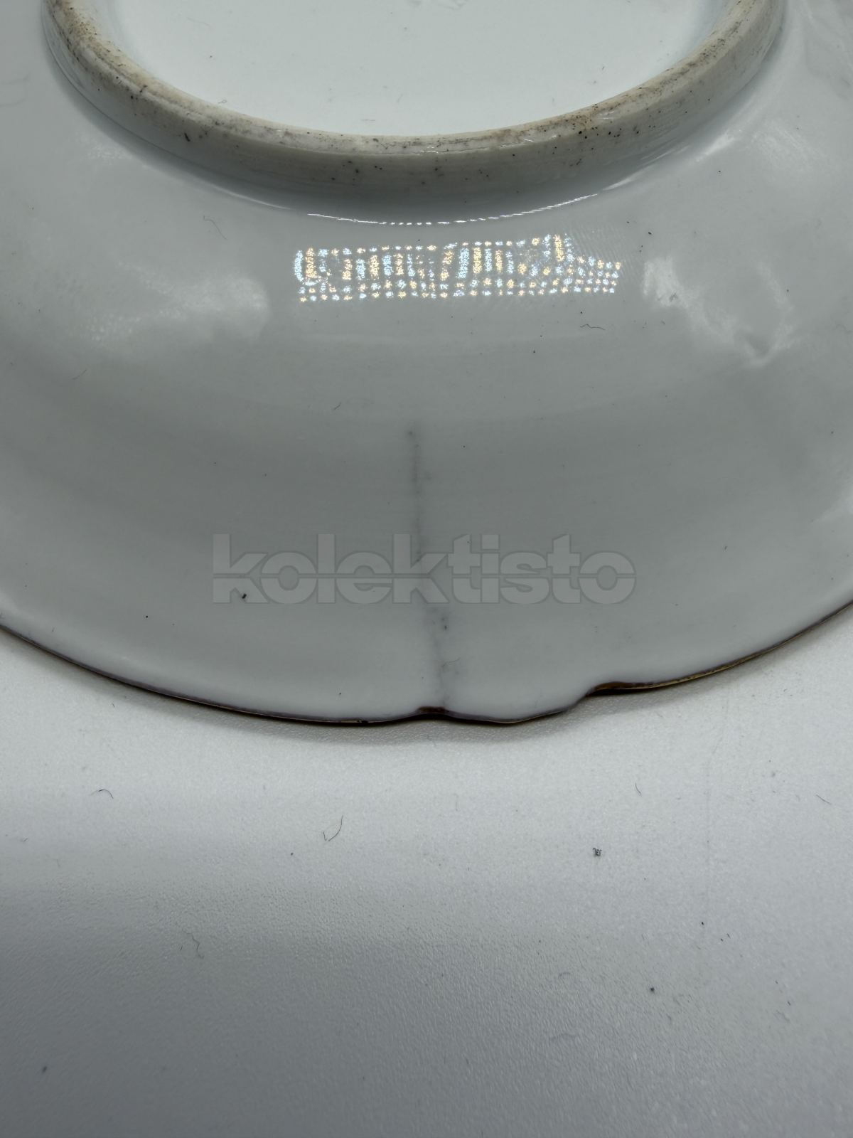 Porcelánový šálek s podšálkem