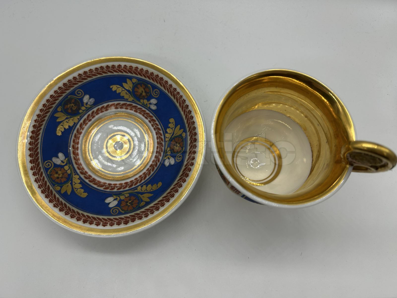 Porcelánový šálek s podšálkem s německým nápisem