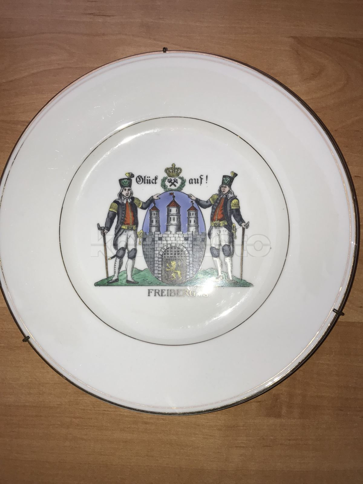 Porcelánový talíř s hornickou tématikou k zavěšení na stěnu