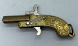Miniaturní pistolka zn. AUSTRIA č.2