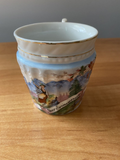 Porcelánový hrnek s obrázkem krajiny