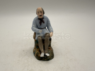 Porcelánová soška muže