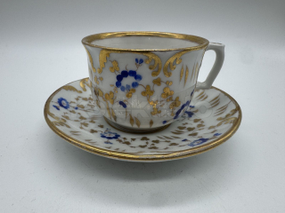 Porcelánový šálek s podšálkem