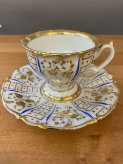 Porcelánový šálek s podšálkem