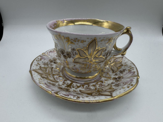 Porcelánový šálek s podšálkem