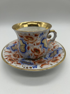 Porcelánový šálek s podšálkem