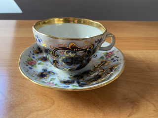 Porcelánový šálek s podšálkem