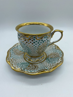 Porcelánový šálek s podšálkem